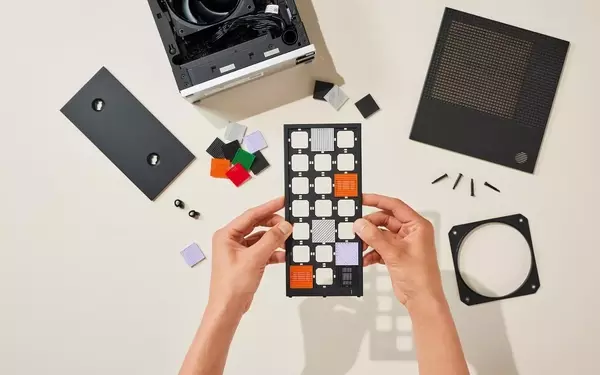 Framework Unveils Compact and Customizable Desktop with Unique Handle Design