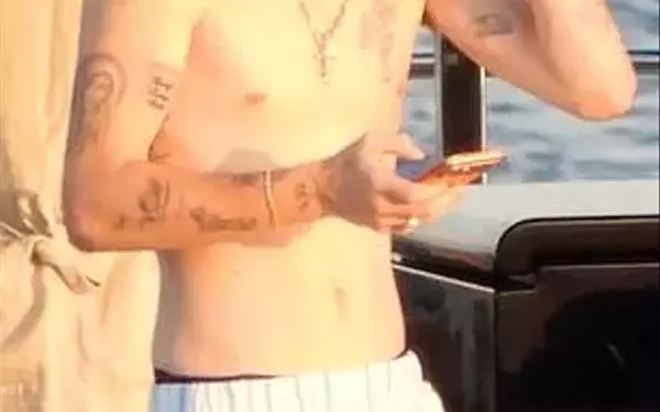 Cruz Beckham Reunited with Family on Yacht, Showcasing Tattoos Akin to Brother Brooklyn Amidst Family Rift