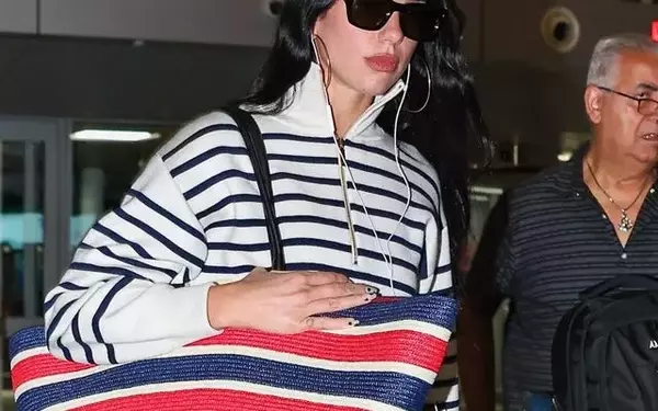 Dua Lipa Redefines Airport Chic with Oversized Chanel Tote
