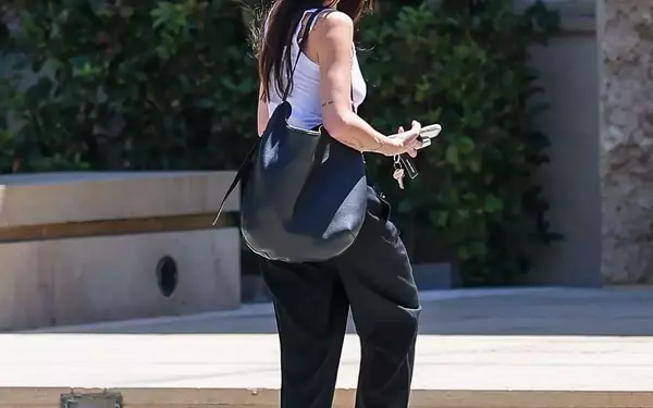 Dakota Johnson Embraces Autumn with a Chic "Glossed Espresso" Hair Transformation