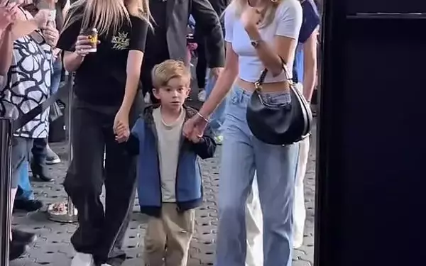Tegan Kynaston Displays Midriff at Kyle Sandilands' Fan Event Alongside Son Otto