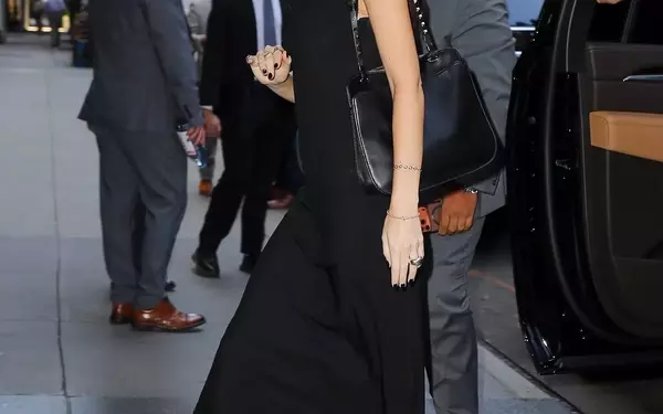 Dakota Johnson's Unexpected Summer Footwear Choice: The Wedge Flip-Flop