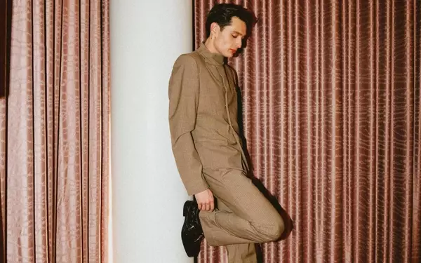 Peso Pluma's Fashion Week Journey: From Escalade to Runway