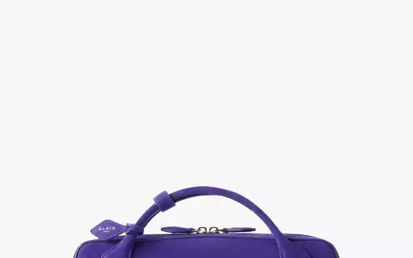 Fashion Week's Defining Trends: Purple Hues, Statement Brooches, and Inventive Styling