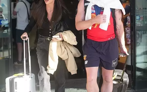 AFL Star Lachie Neale and Partner Emma Field's Public Affection After Grand Final Victory