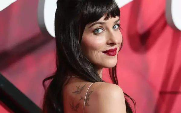 Dakota Johnson Revives Precision Red Lip at "Verity" Premiere