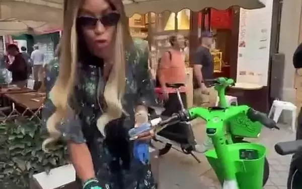 Naomi Campbell's Germaphobia Goes Viral: Supermodel Navigates Paris Fashion Week on a Lime Bike with Disinfectant and Gloves