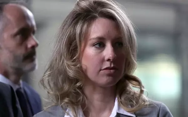 Interactive Website Simulates Elizabeth Holmes's Theranos Desk Experience