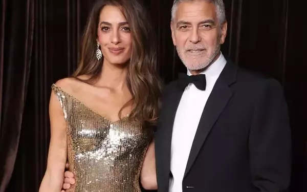 Amal Clooney Dazzles in Gold at the Albies