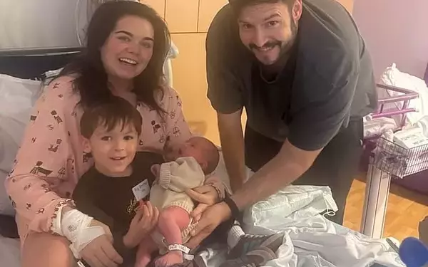 Scarlett Moffatt Introduces Newborn Son Clark to Big Brother Jude in Heartwarming Family Photo