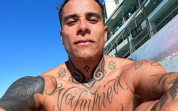 Tattoo Artist Alleges Discrimination at Exclusive Club Over Neck Tattoos